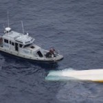 Police rescue two men from capsized boat Police rescue two men from capsized boat
