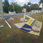 Suspect drunk driver ploughs into political board Suspect drunk driver ploughs into political board