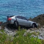 Car crashes onto ironshore in East End Car crashes onto ironshore in East End