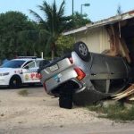 Car smashes into wooden building Car smashes into wooden building