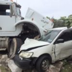 Dump truck and car crash head-on in BT Dump truck and car crash head-on in BT
